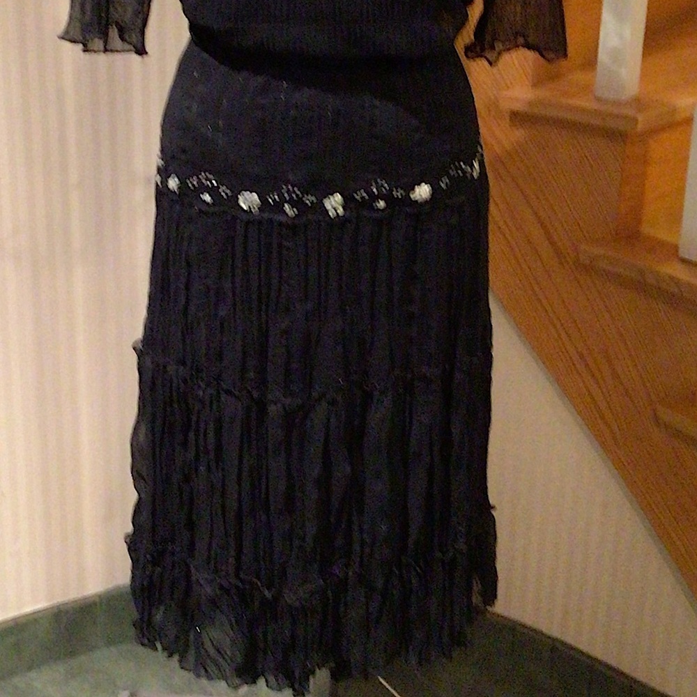 Slip on elasticized waistband black skirt with sequins